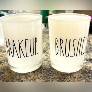 Set of Rae Dunn glass brush and make up holder cups.